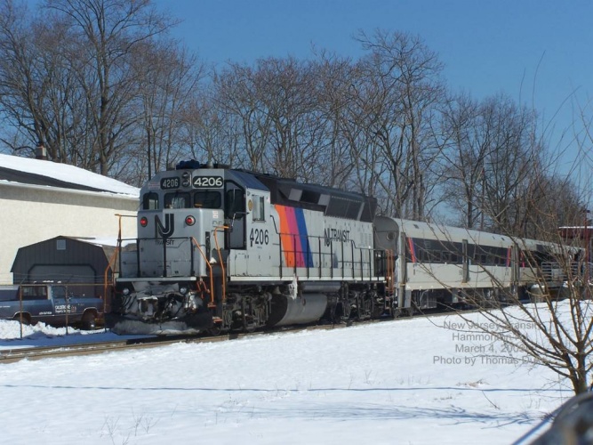New Jersey Transit 4206 basks in the sunlight and snow at Hammonton on March 4, 2009. Photo by Thomas Duke,