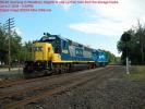 PA-40 reversing through the interlocking at Woodbury.