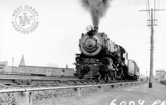 PRSL engine 6009 (class E6s 4-4-2) with seashore-bound train on curve at CENTER Tower. 1936